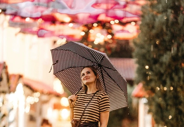Woman With Compact Umbrella